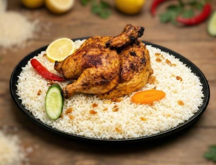 نصف دجاجة مشوية